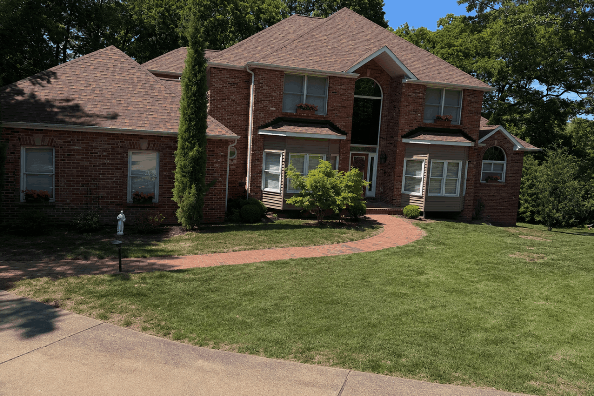before black mulch landscaping transformation for West county property